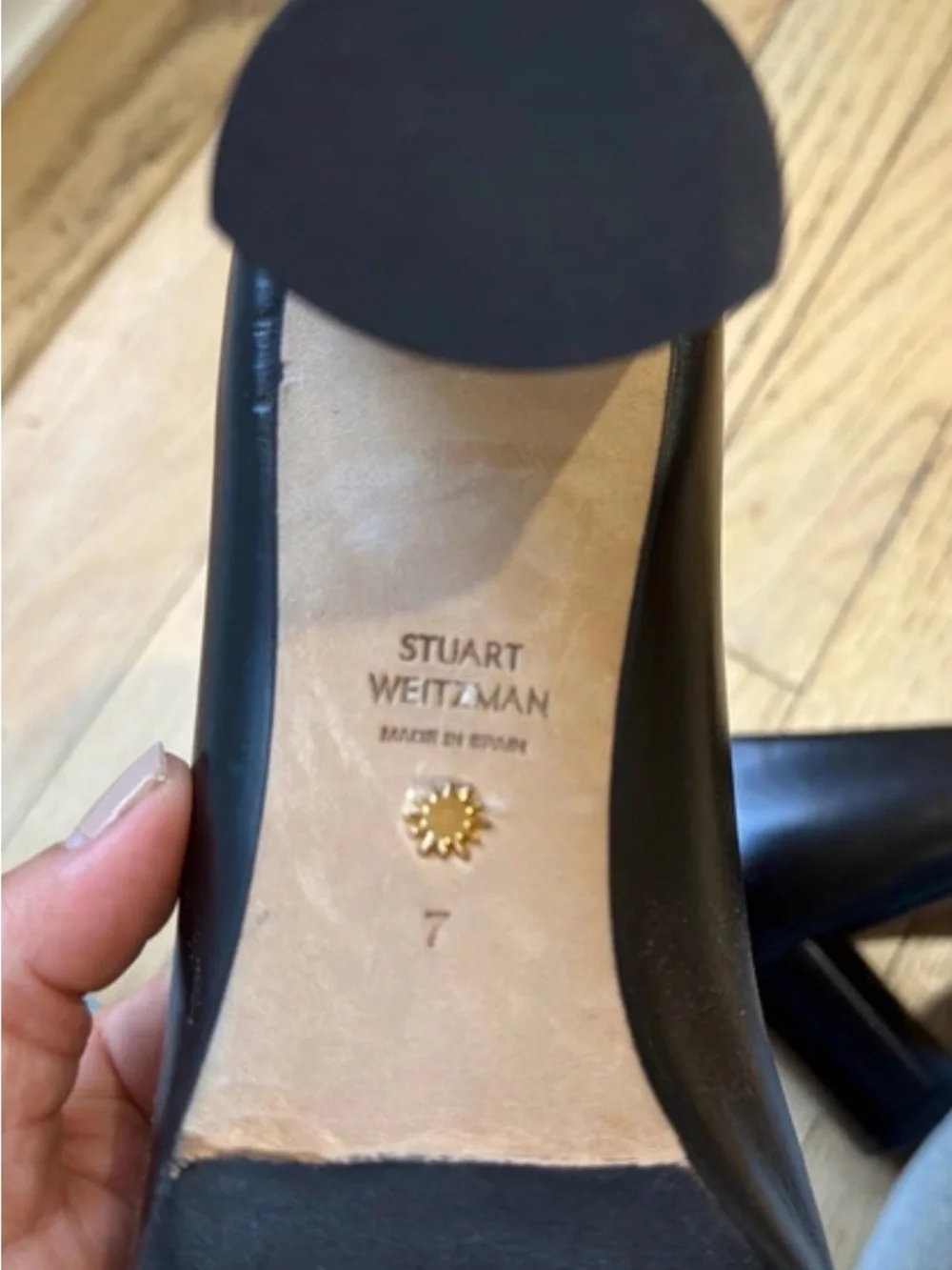 Stuart Weitzman Black Leather Pumps with Gold Buckle Accent